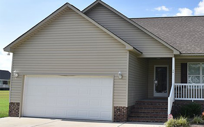 Top 5 Things To Consider Before Replacing Your Old Garage Door